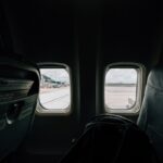 a view of the inside of an airplane looking out the window