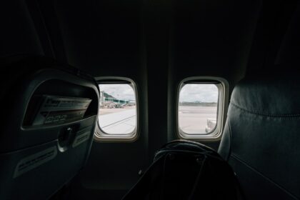 a view of the inside of an airplane looking out the window